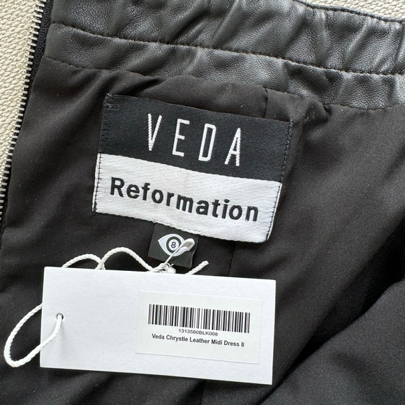 Reformation black leather strapless dress in size 8 - Picture 5 of 6